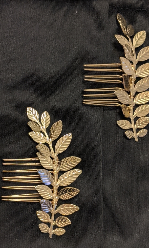 Set of gold leaf hair combs